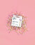Pink cotton swabs stacked in a neat arrangement on a pink background, creating a vibrant pink display.